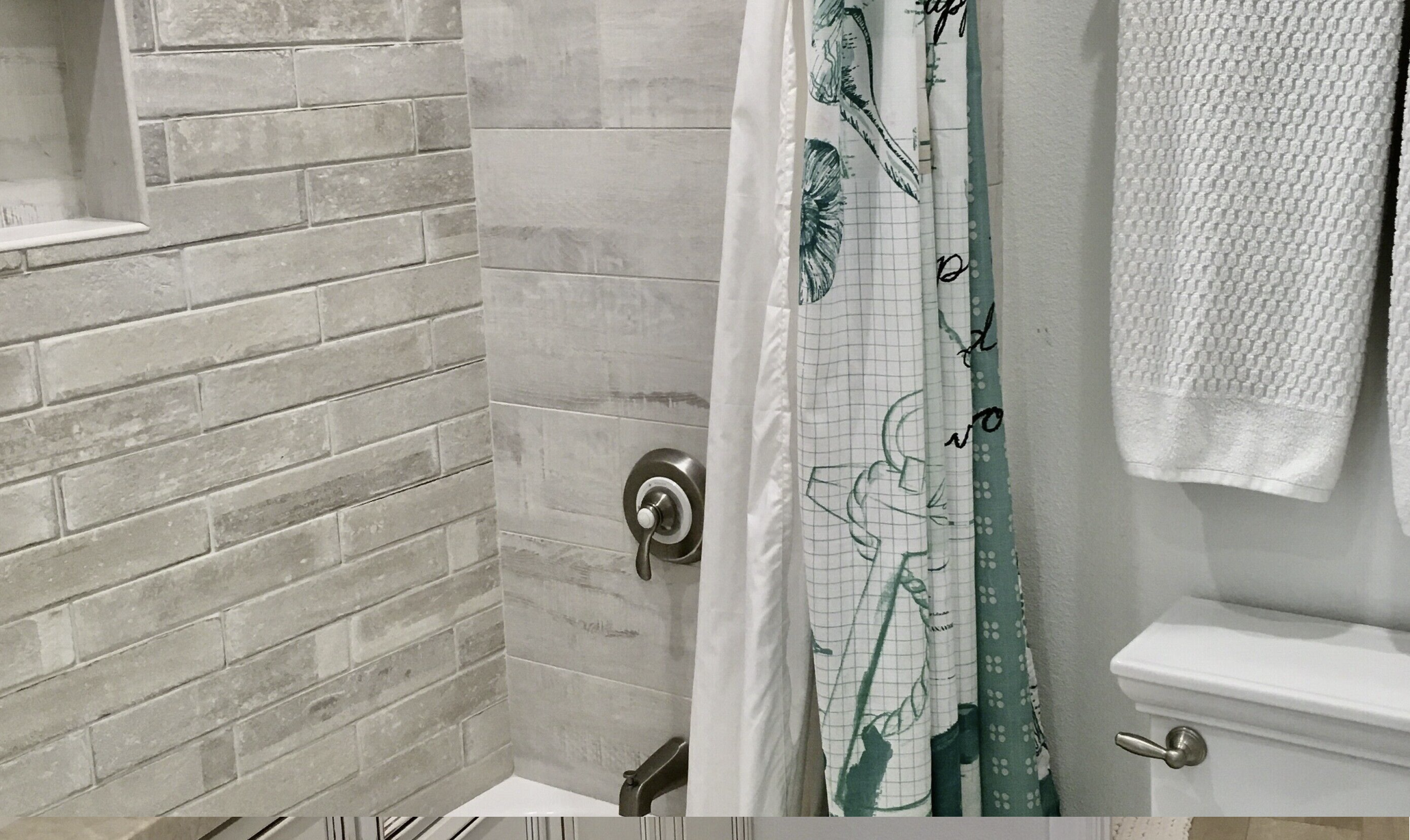 Bedroom 2 shower with custom tile